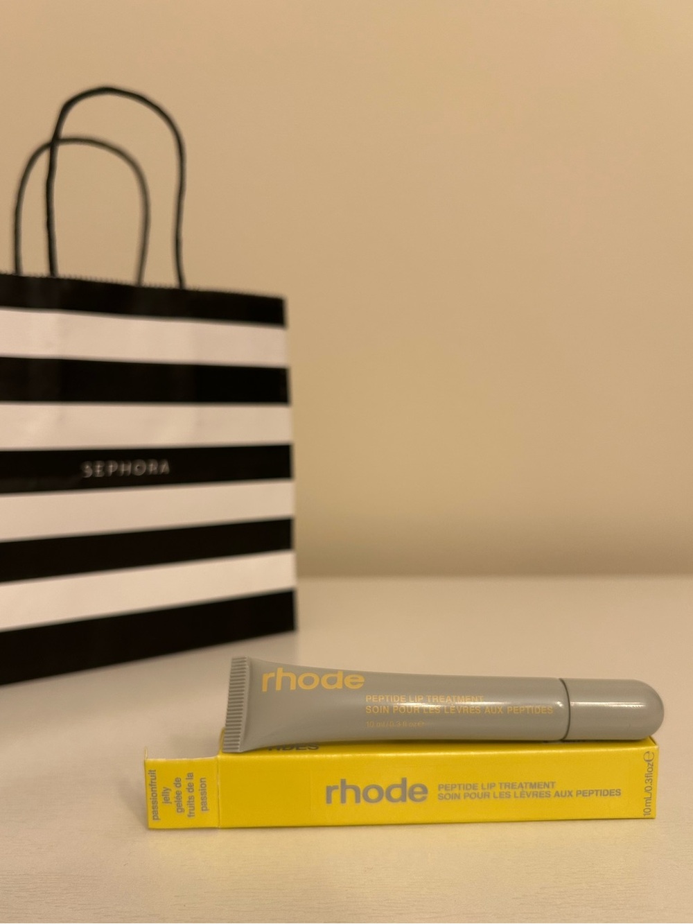 Rhode Peptide Lip Tint “Passionfruit Jelly” Hailey Bieber Glazed lips
